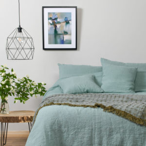 Washed Bed Linen in Blue Greenish Color. Linen Bedding: duvet cover, pillowcase, bed sheet. Produced in Europe.