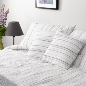 White linen bedding in grey stripes. Produced by AB 'Siūlas'